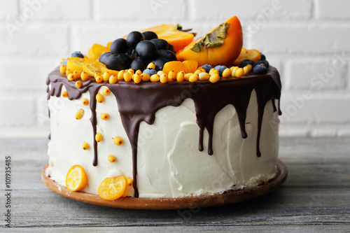 Canvas cake with fruits and cream