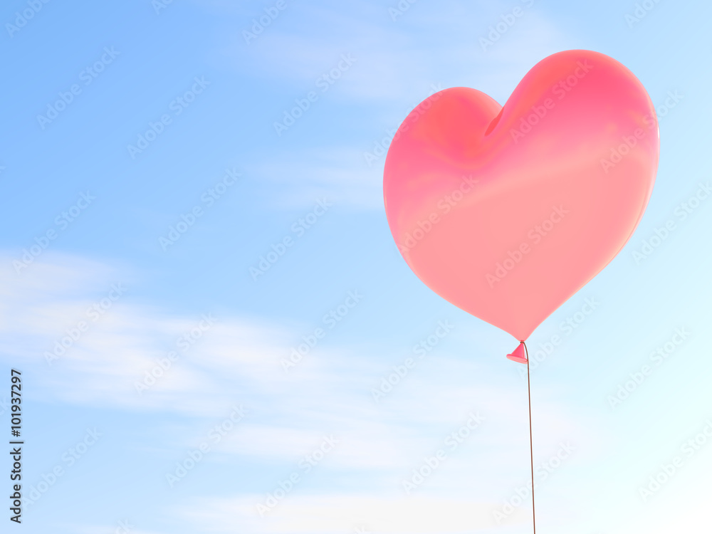 Heart shaped red balloon with blue sky background.