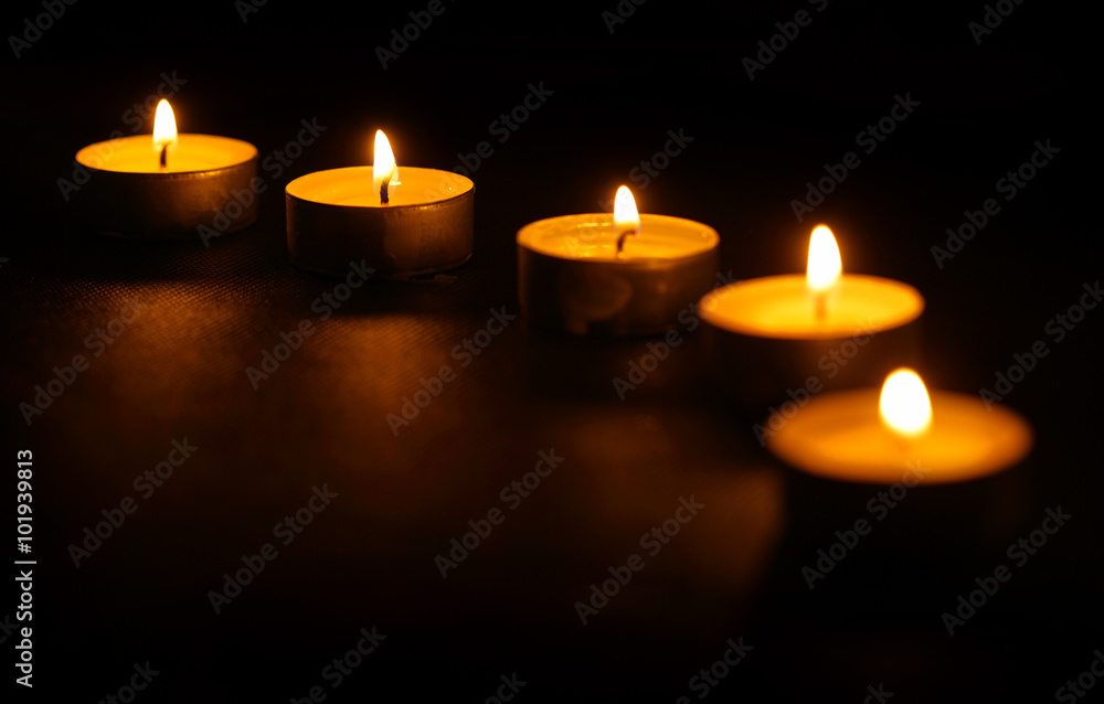 Five candles in line at dark Five candles in line at dark