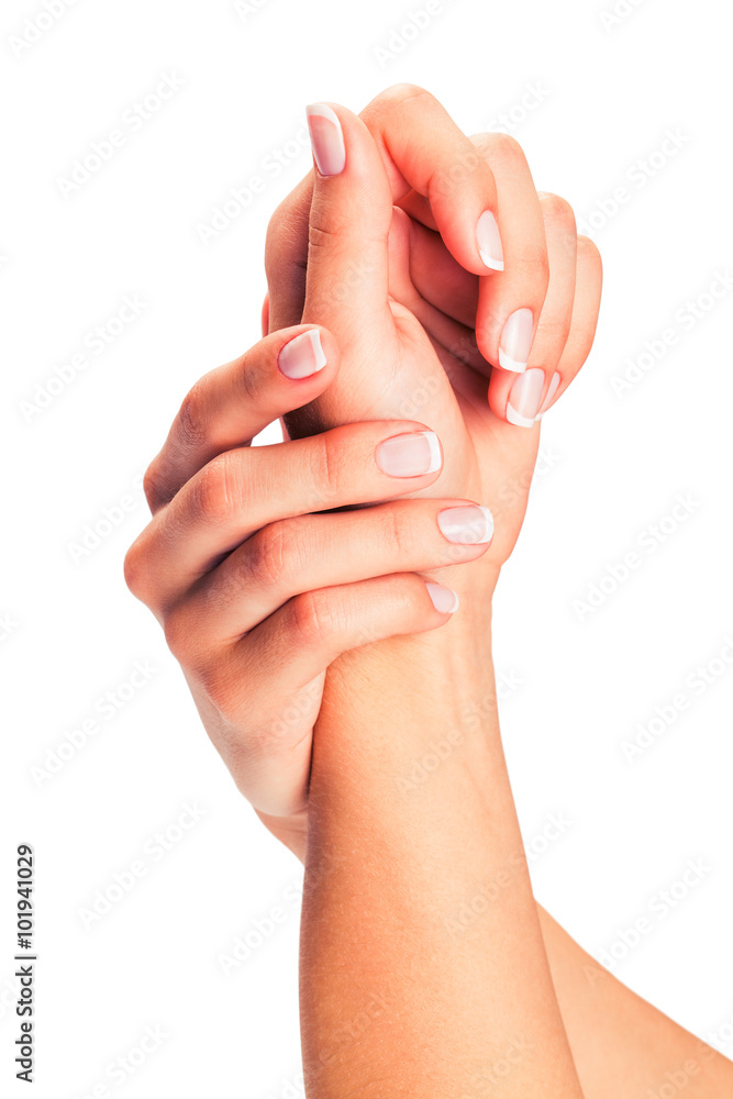 Woman hands with french manicure isolated on a white background Woman hands with french manicure isolated on a white background