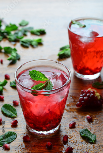 Pomegranate drink with mint and ice