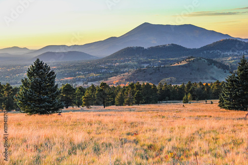 Photography Warm sunset glow on the mountain landscape in Flagstaff, Arizona