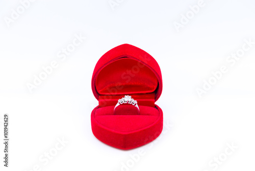 Diamond ring in the red heart box isolated on white background