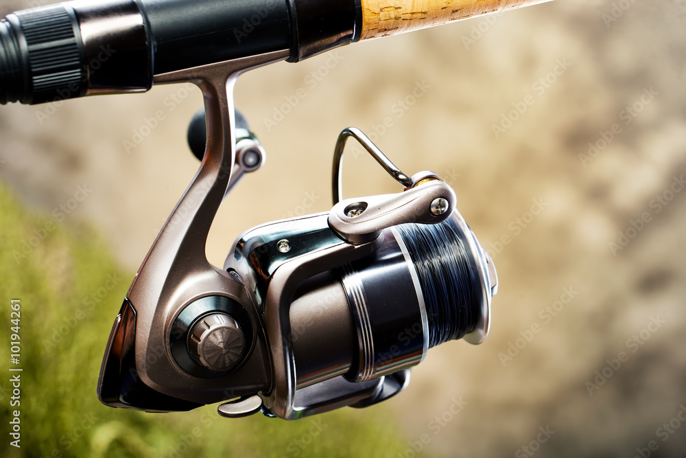 fishing tackle on a wooden table. toned image
fishing tackle on a wooden table. toned image