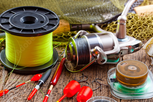 fishing tackle on a wooden table