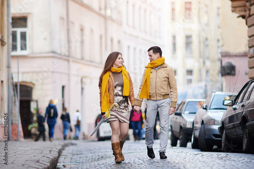 loving couple walking through the old city Lviv © timonko