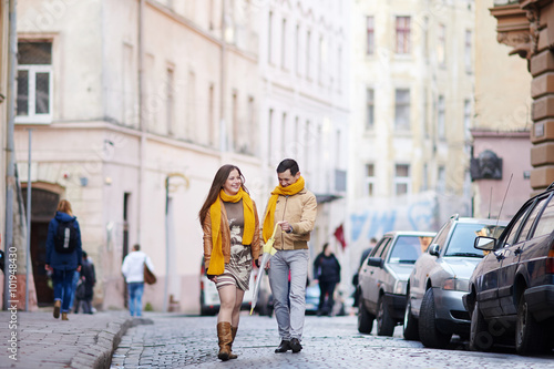 loving couple walking through the old city Lviv