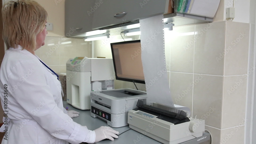 analysis of blood: studying under the microscope by the doctor in the lab analysis of blood: studying under the microscope by the doctor in the lab