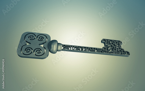 The key is a maze, on a gray gradient background. photo