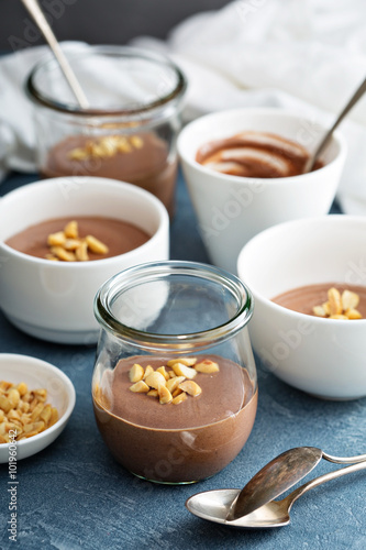 Chocolate yogurt dessert with salted peanuts