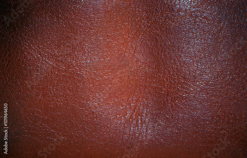 Elastic background of soft porous rough brown leather