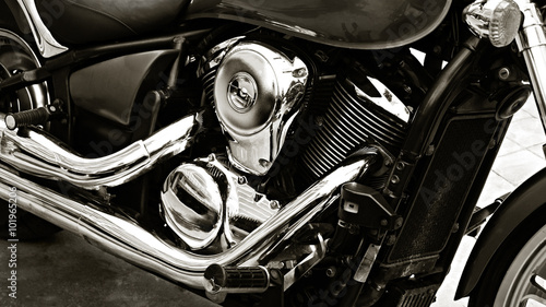 Motorcycle, metal and chrome engine parts in closeup