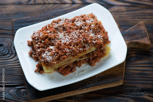 High angle view of lasagna bolognese, studio shot, closeup