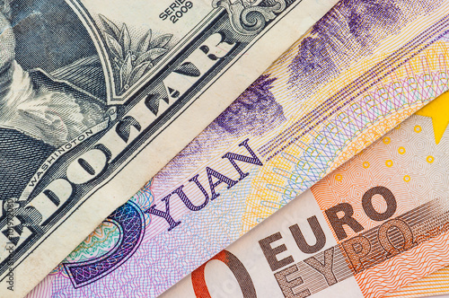 U.S. one dollar bill, five yuan and fifty euro