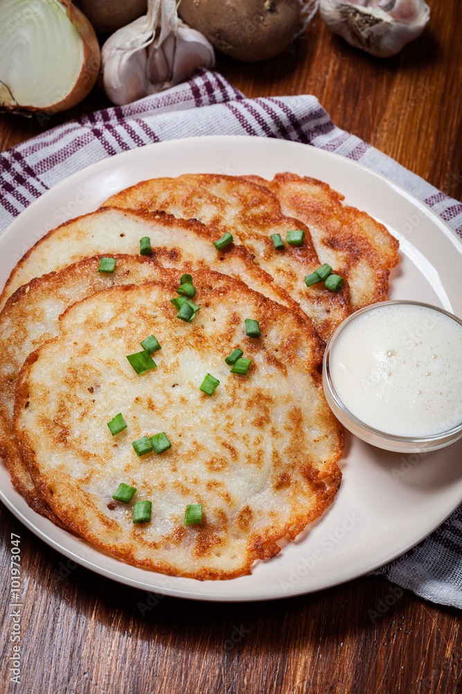 Potato pancakes with sour cream Potato pancakes with sour cream