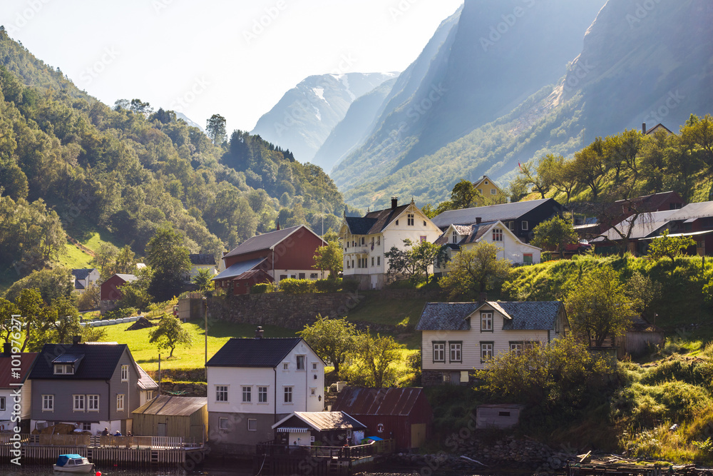 Landscape with houses in mountains at Norway fjord
