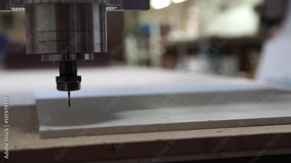 Milling cutting machine makes a plotter cutting in plastic Milling cutting machine makes a plotter cutting in plastic