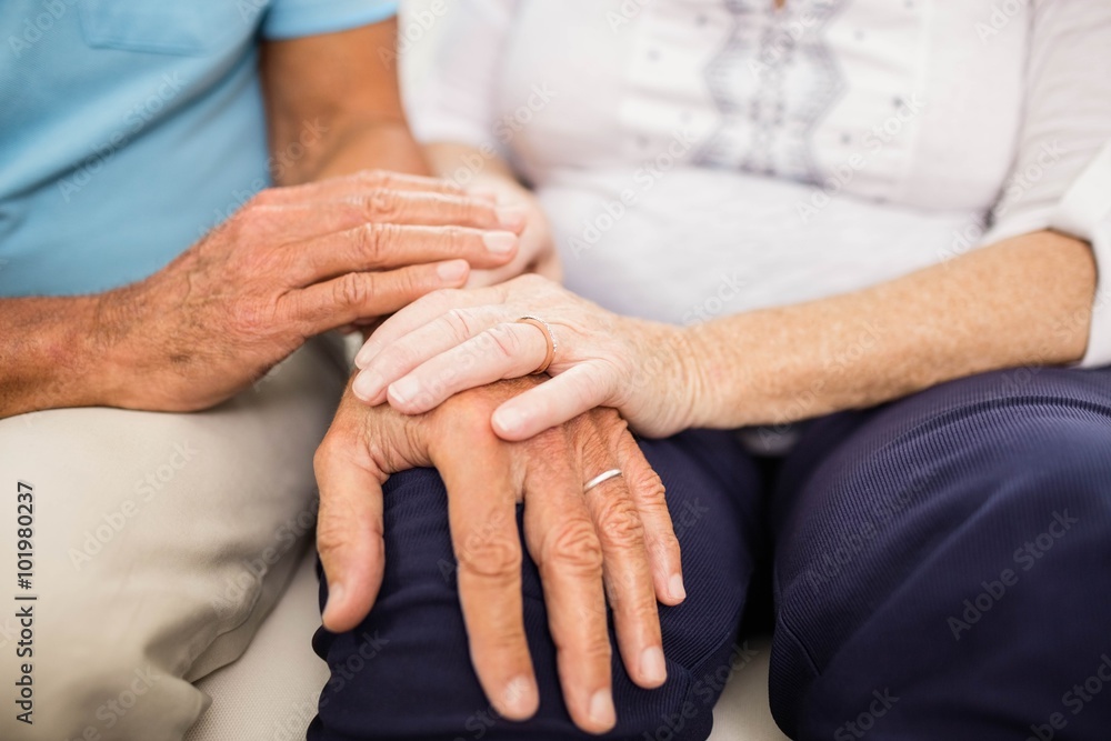 Cute senior couple holding hands Cute senior couple holding hands