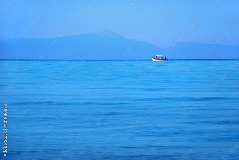 A white boat in the marine landscape