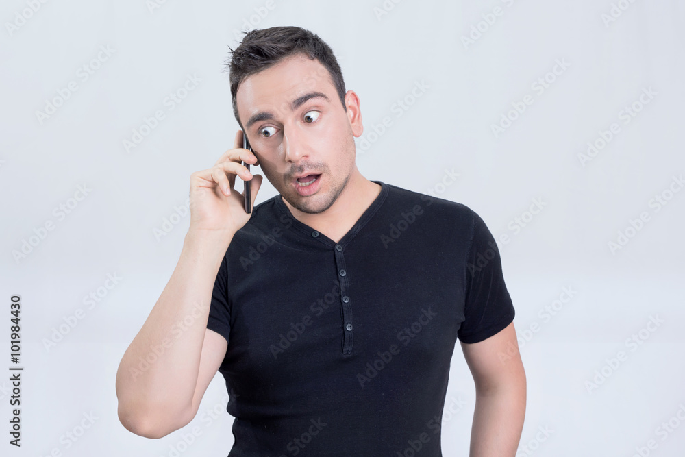 Surprised man on a phone Surprised man on a phone
