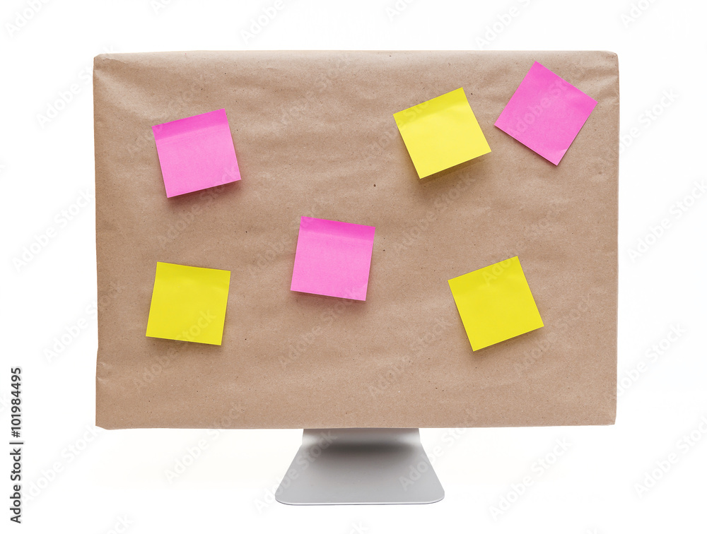 Colorful remind note on a paper wrapped computer monitor Colorful remind note on a paper wrapped computer monitor