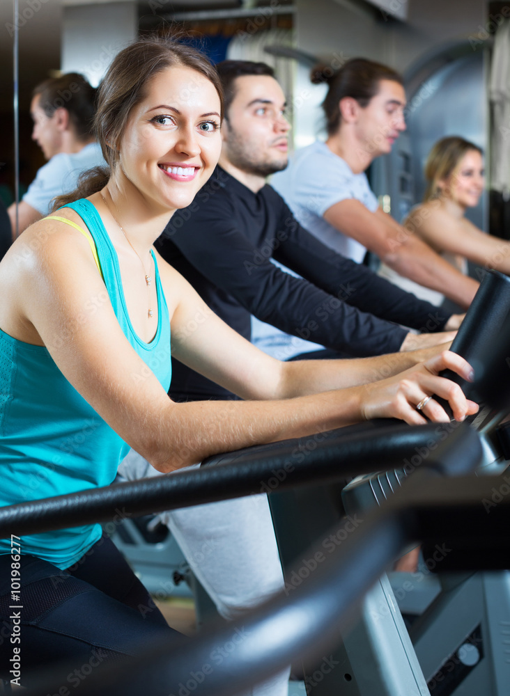 Fototapeta premium Adults training on treadmills