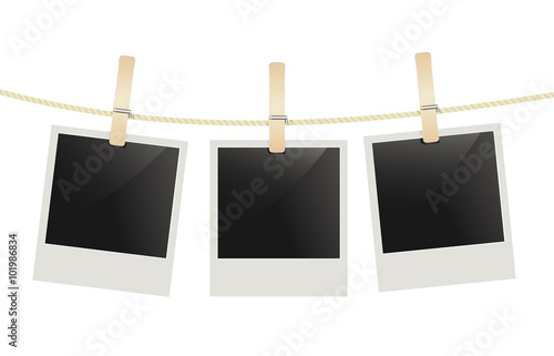 photo frames hanging on a rope with clothespins. vector