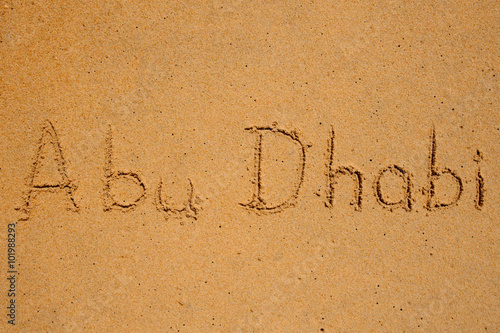 abu dhabi written in the sand