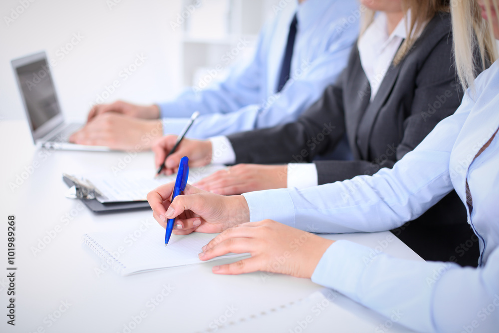 Group of business people working together in office Group of business people working together in office