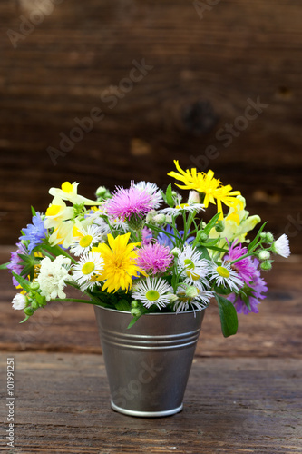 Wallpaper Mural     Bouquet of meadow flowers in small bucket - vertical  Torontodigital.ca