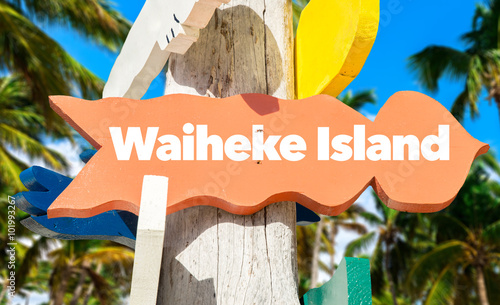 Waiheke Island welcome sign with palm trees