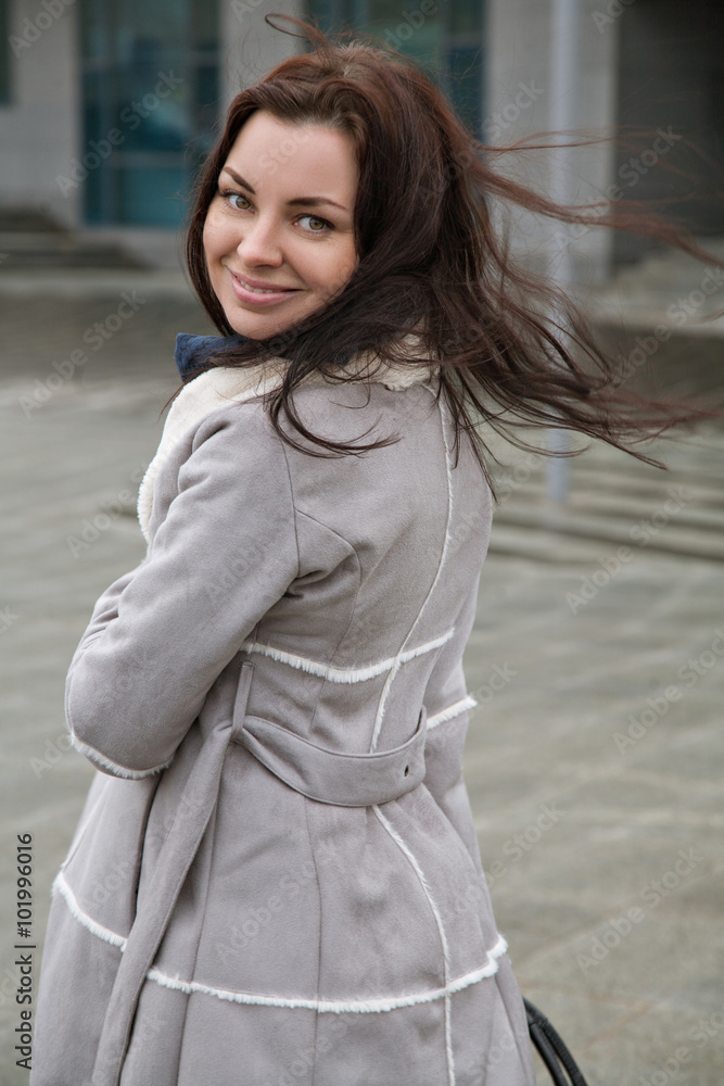 girl with a cheerfull smile on the street