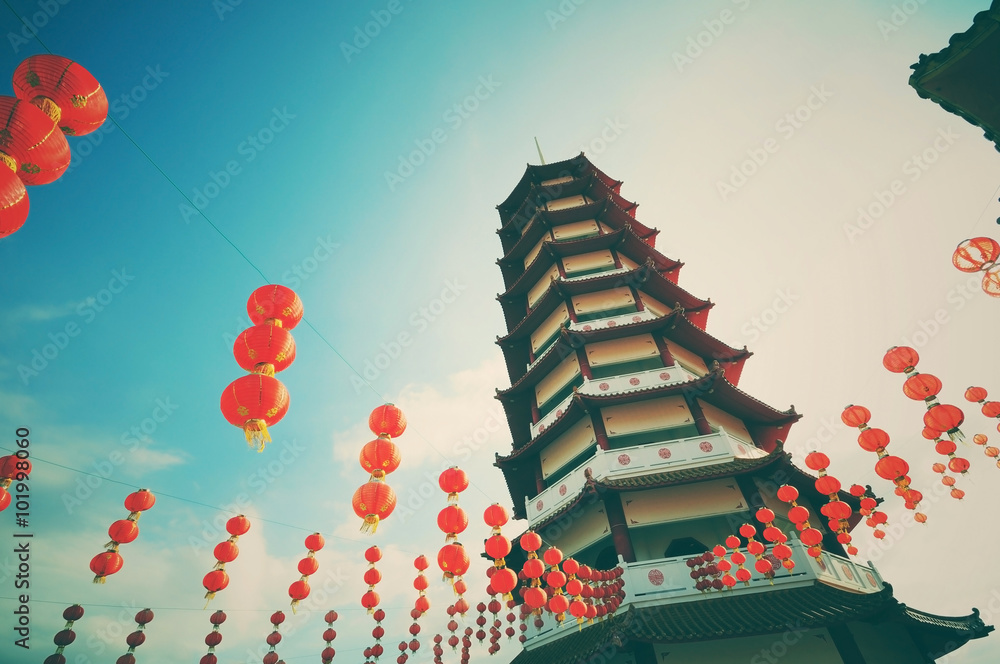 Fototapeta Vintage and retro style pagoda and chinese new year lanterns with filter and vignette effect