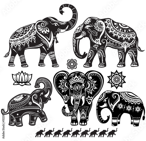 Set of decorated elephants on black photo
