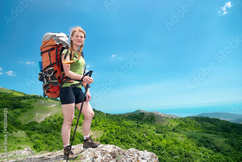 Hiking woman with backpack