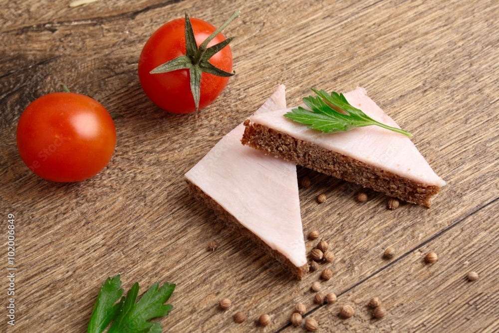 Sandwich with ham and tomatoes Sandwich with ham and tomatoes