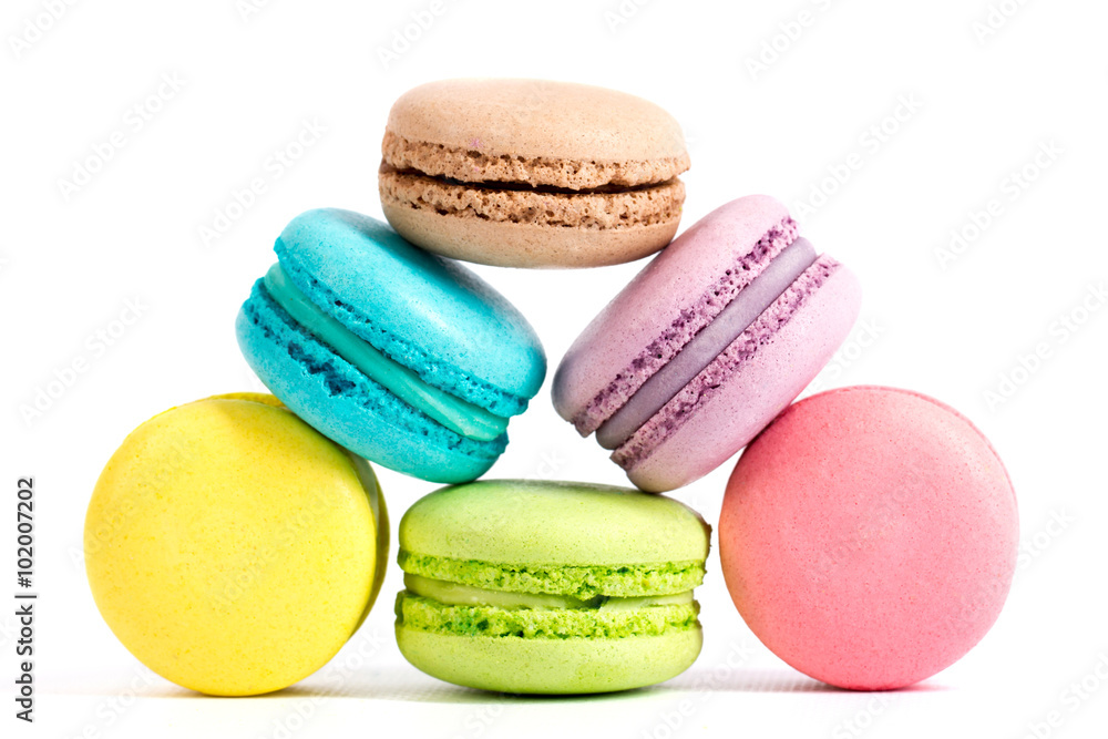 Collection of brightly colored French macarons on white background Collection of brightly colored French macarons on white background