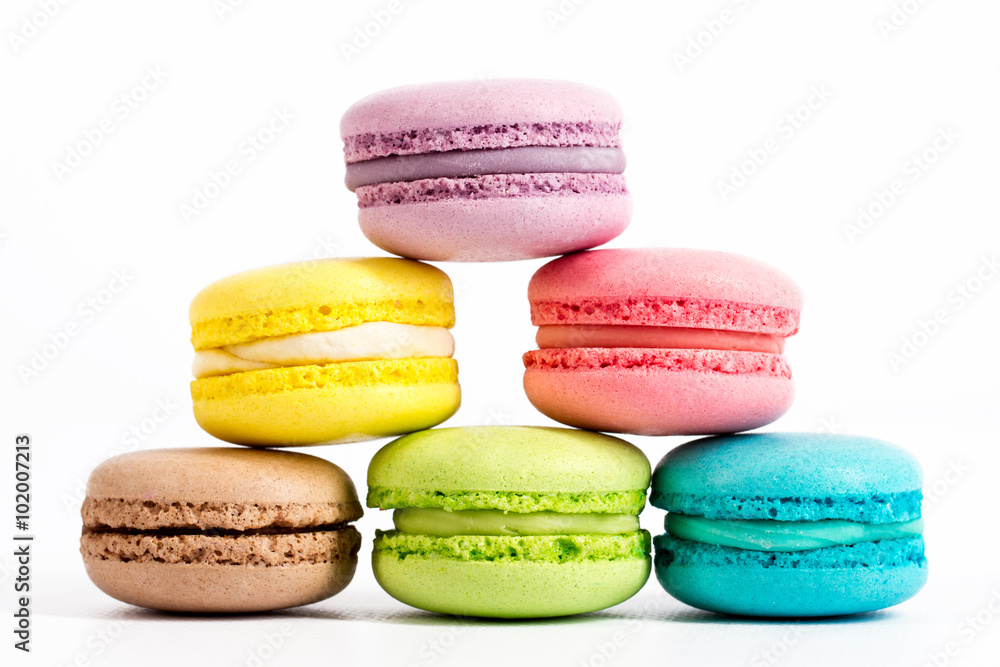 Collection of brightly colored French macarons on white background Collection of brightly colored French macarons on white background
