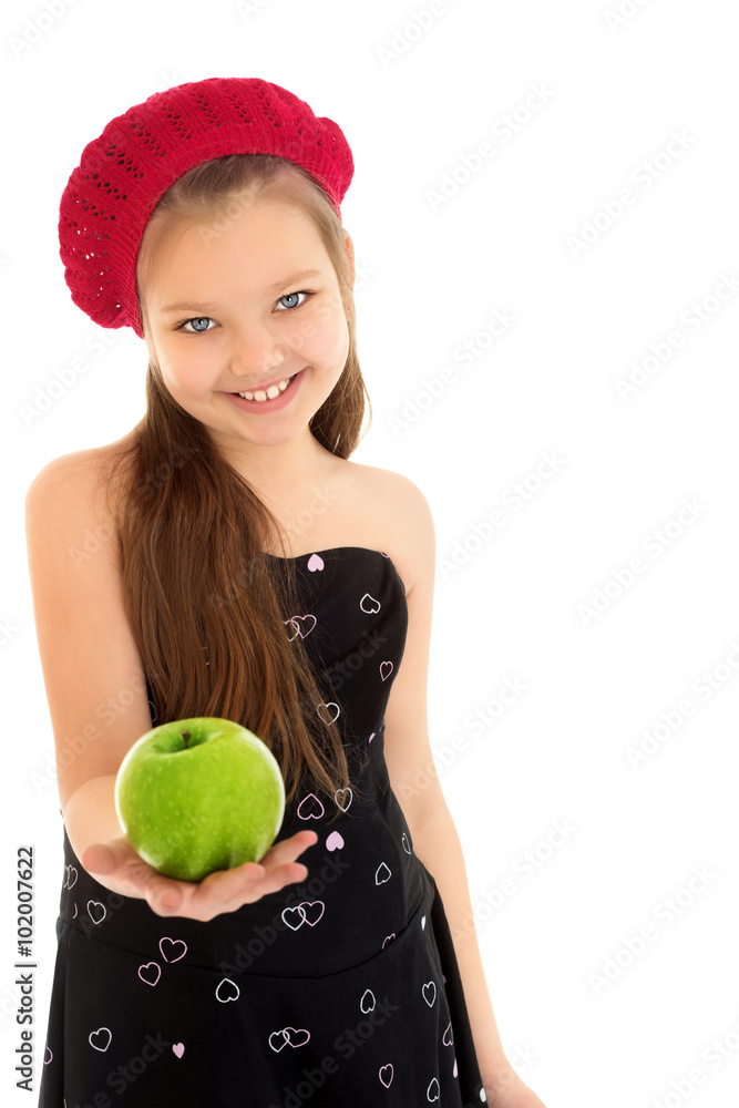  The girl holds out an Apple