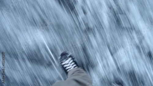 Ice skating on a frozen lake covered with snow
