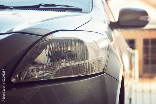 Selective focus point on Headlight lamp car  Vintage filter