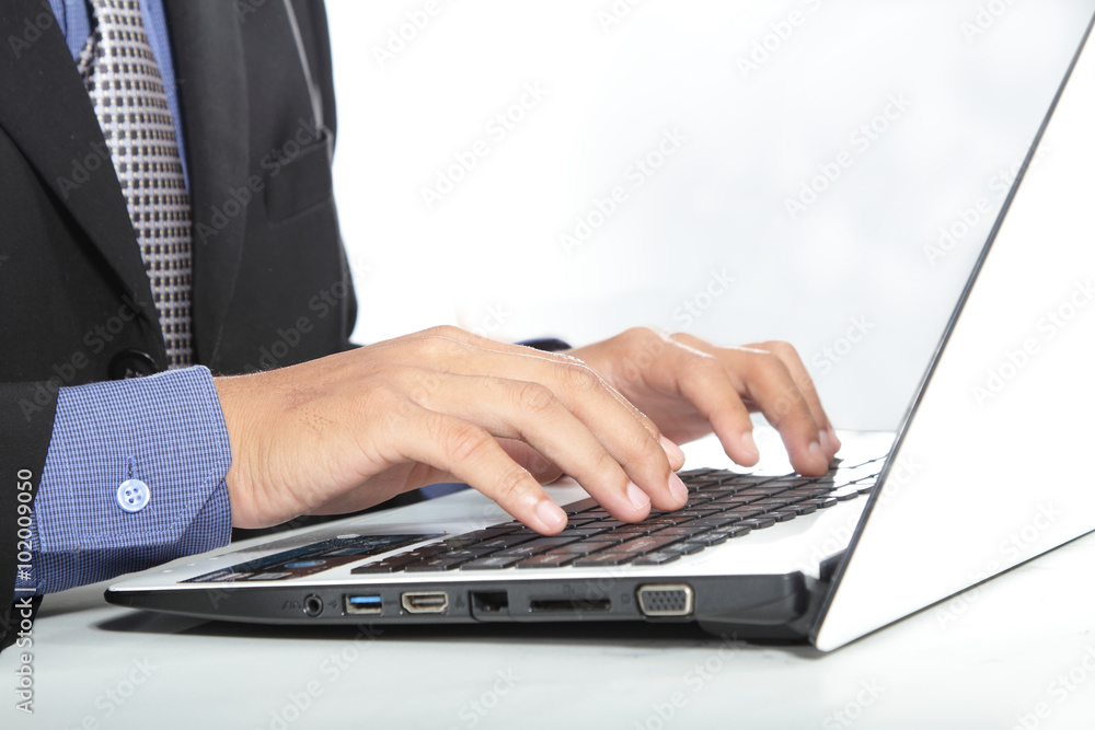 Business person working on computer against technology background Business person working on computer against technology background