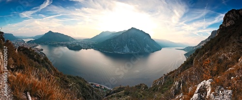 Panoramic view above scenic Como lake and Alps in the evening, Italy.