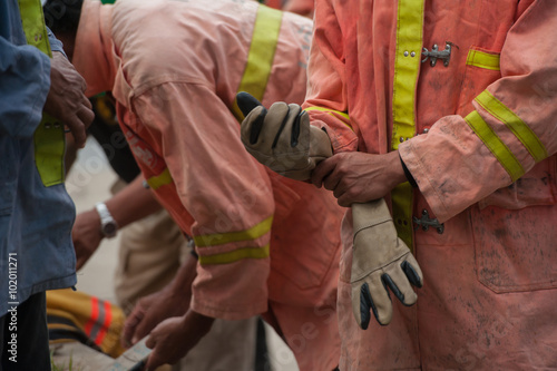 A firefighters dress their suit before the operating