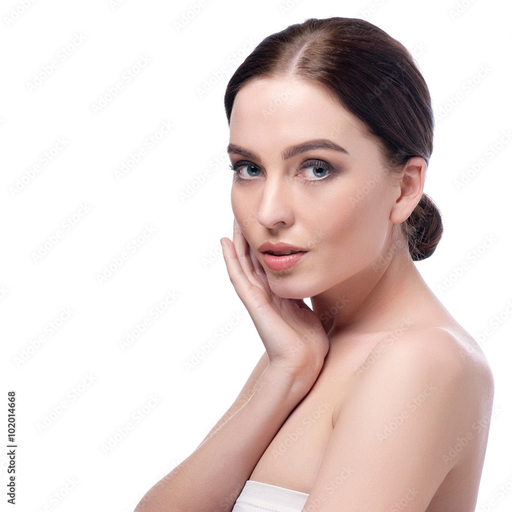 Beauty Woman Face closeup. Beautiful brunette young spa model girl with perfect skin. Skin care concept. Fresh Clean Skin. Portrait of female looking at camera and smiling. Beige background Beauty Woman Face closeup. Beautiful brunette young spa model girl with perfect skin. Skin care concept. Fresh Clean Skin. Portrait of female looking at camera and smiling. Beige background