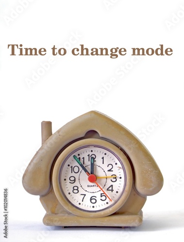 Cute house shape alarm clock with phrase time to change mode, photo