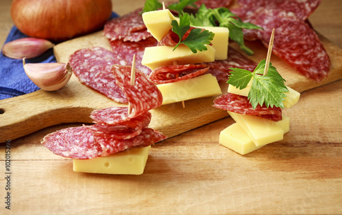 cheese and sausage slices for an appetizer