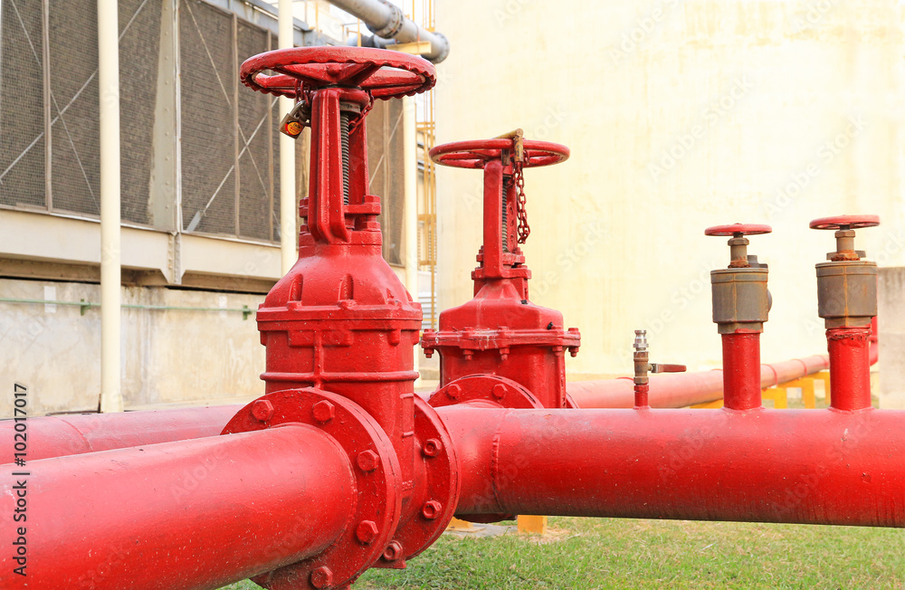 Red fire hose valve in the plant Red fire hose valve in the plant