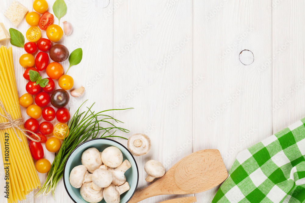 Italian food cooking ingredients. Pasta, vegetables, spices Italian food cooking ingredients. Pasta, vegetables, spices
