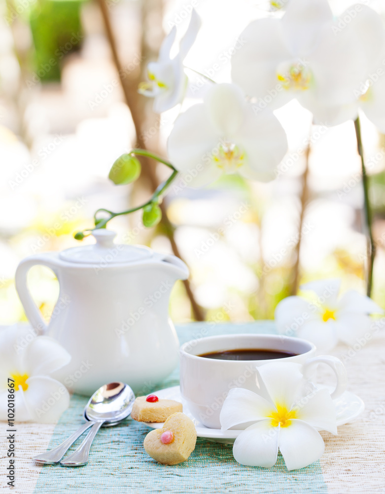 Romantic breakfast concept Cup of coffee with sugar icing decorated heart shaped cookies. Cheerful romantic morning Romantic breakfast concept Cup of coffee with sugar icing decorated heart shaped cookies. Cheerful romantic morning